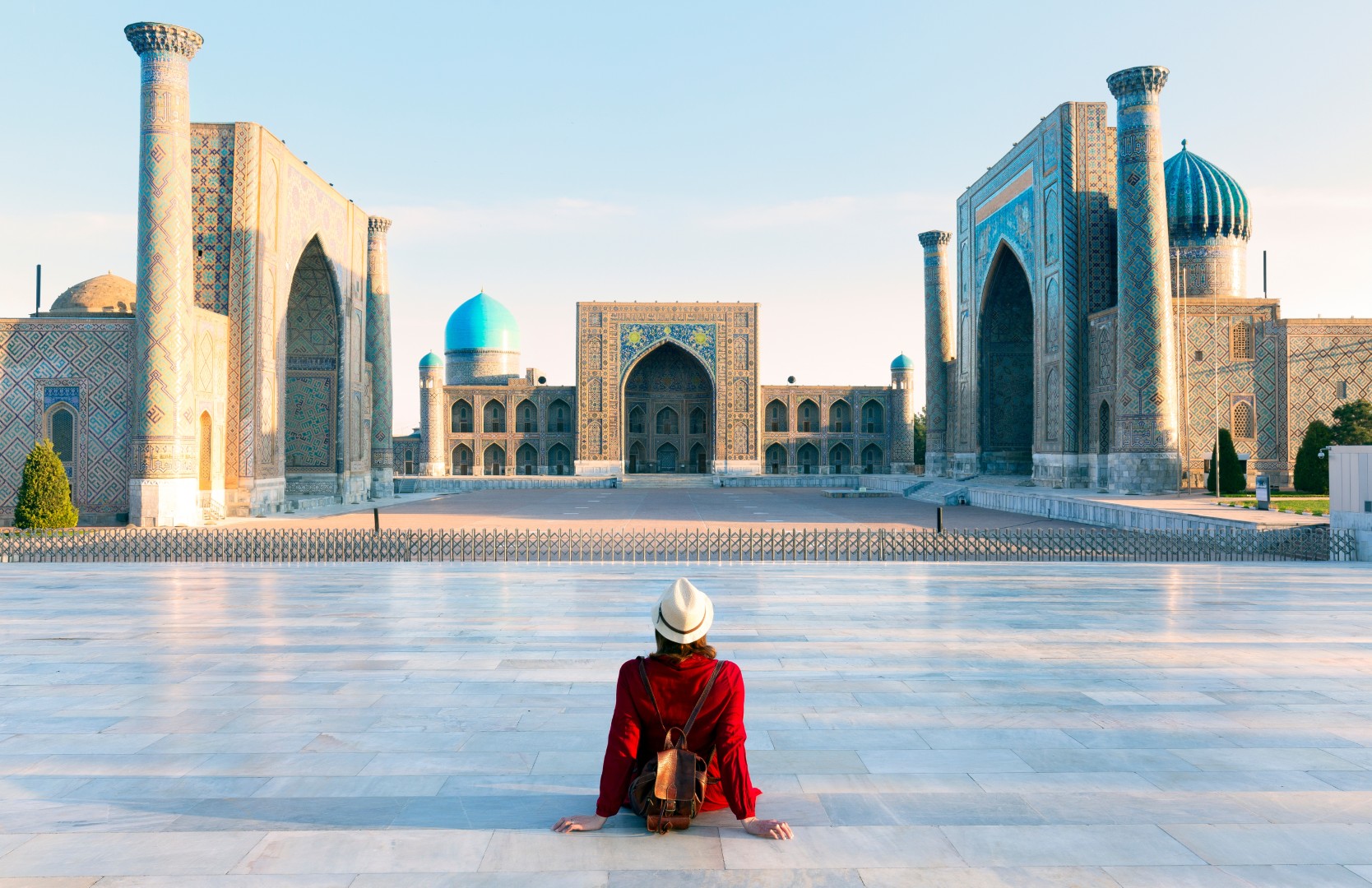 touristwomanwithhatanddressredsittingonregistan-2